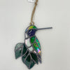 Hummingbird on Leaves
