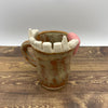Tea-th Cup