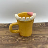 Tea-th Cup